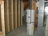 Furnace room looking under stairs in back of bathroom / bedroom