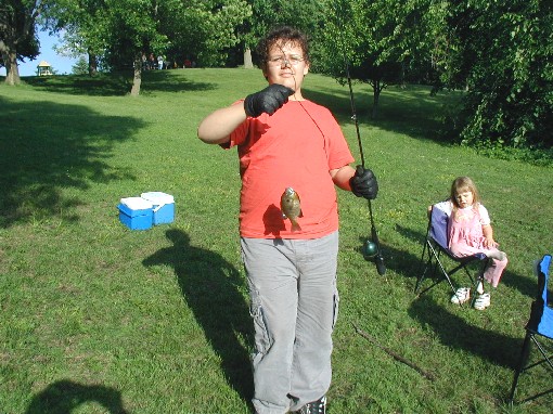 Daniel's catch of the day, this Blue-Gill is actually a lot bigger than it appears!