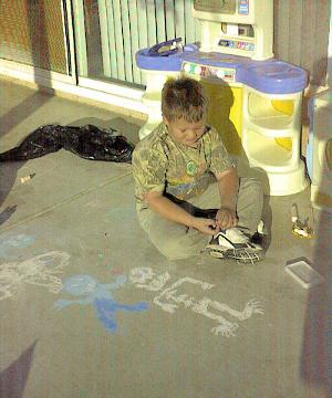 Daniel on the back patio with chalk, 7 May 2000
